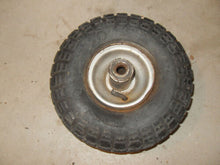 Load image into Gallery viewer, Vintage Carlisle Indian Head Mini Bike Tire with Rim - 4.10 / 3.50 x 4