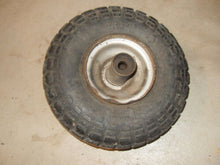 Load image into Gallery viewer, Vintage Carlisle Indian Head Mini Bike Tire with Rim - 4.10 / 3.50 x 4