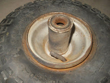 Load image into Gallery viewer, Vintage Carlisle Indian Head Mini Bike Tire with Rim - 4.10 / 3.50 x 4