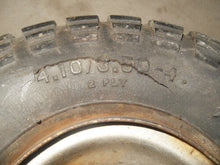 Load image into Gallery viewer, Vintage Carlisle Indian Head Mini Bike Tire with Rim - 4.10 / 3.50 x 4