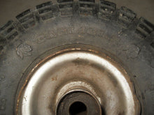 Load image into Gallery viewer, Vintage Carlisle Indian Head Mini Bike Tire with Rim - 4.10 / 3.50 x 4