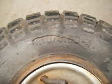 Load image into Gallery viewer, Vintage Carlisle Indian Head Mini Bike Tire + Rim - 4.10 / 3.50 - 4