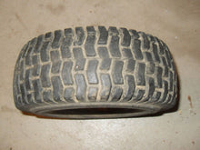 Load image into Gallery viewer, Vintage Carlisle Tire with Rim - 4.10 / 3.50 x 4