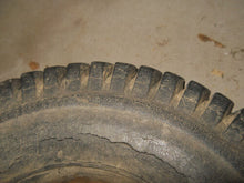 Load image into Gallery viewer, Vintage Carlisle Tire with Rim - 4.10 / 3.50 x 4