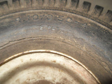 Load image into Gallery viewer, Vintage Carlisle Tire with Rim - 4.10 / 3.50 x 4
